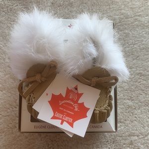 New in box. Natural deer leather baby mocassins